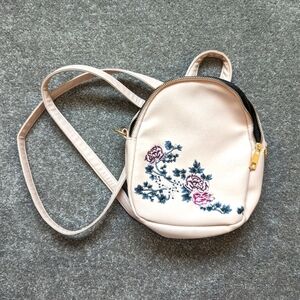 Ardene faux leather floral embroidered pink backpack